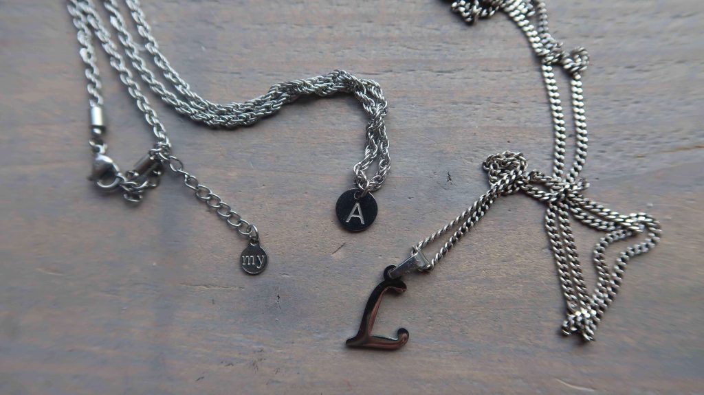 A necklace with initials. The jewelry trend of today